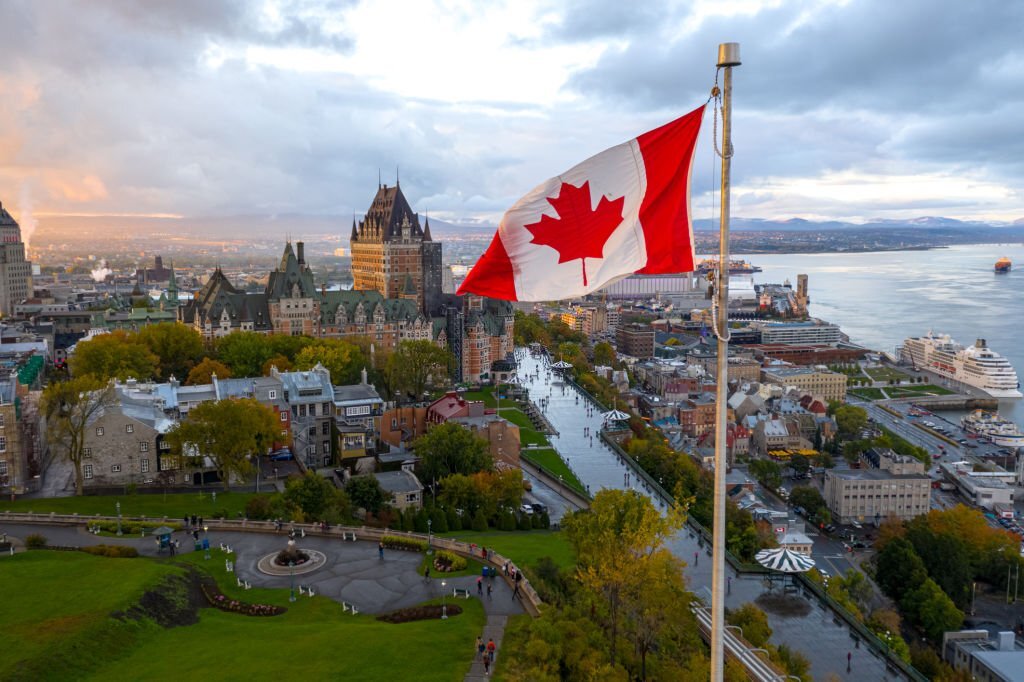 How long will an immigrant stay in Canada to become a citizen?